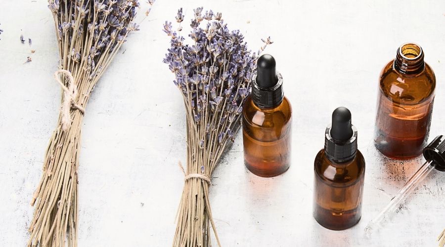lavender-bundles-next-to-brown-oil-bottles