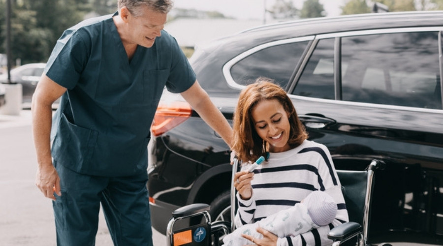 woman using queaseEase essential oil inhaler post labor and delivery