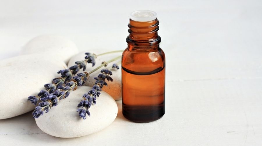 lavender with stones and lavender oil